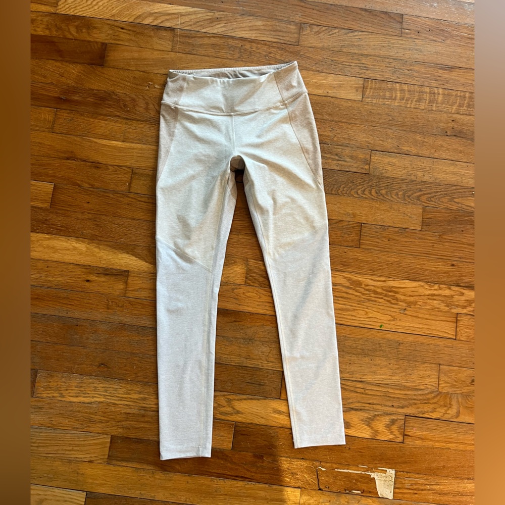 Tan and gray “Outdoor Voices” leggings